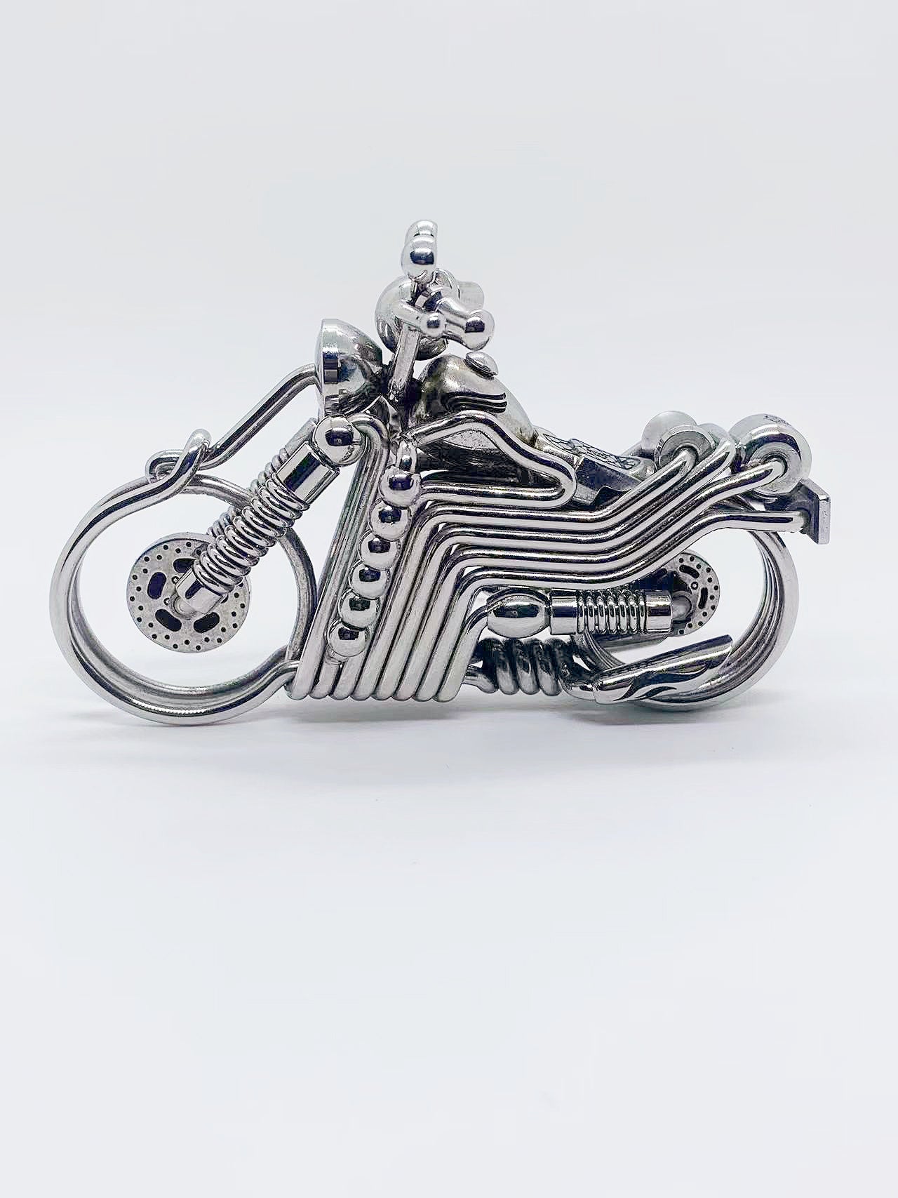 Collection level handmade car or motorcycle keychain - the first motorcycle model